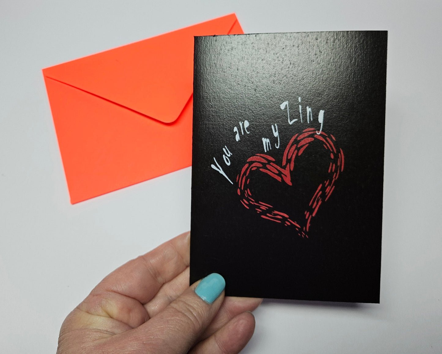 You are My Zing Greeting Card printed on black cardstock. With a bright red envelope in a biodegradable acetate sleeve. Size A6. Digital design