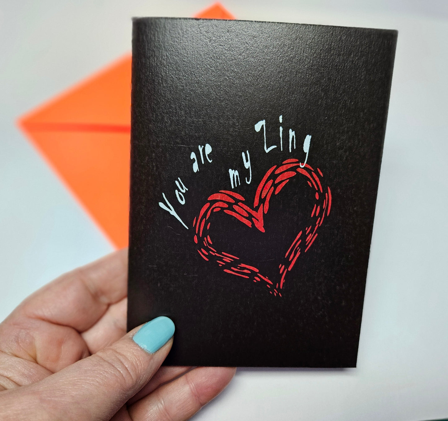 You are My Zing Greeting Card printed on black cardstock. With a bright red envelope in a biodegradable acetate sleeve. Size A6. Digital design