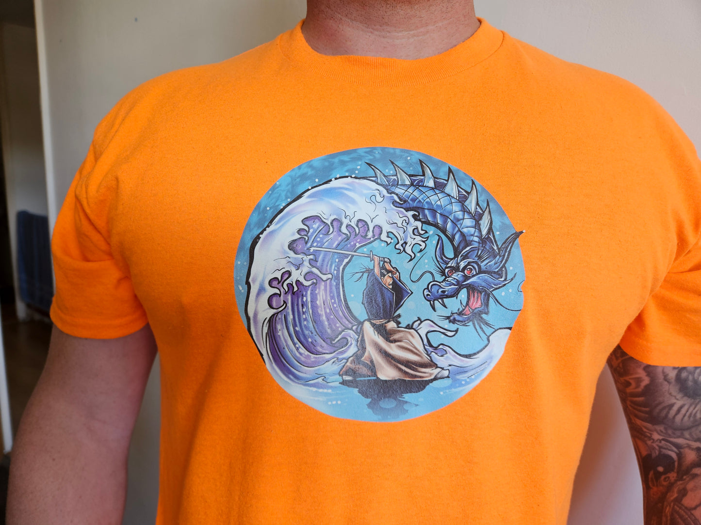 3D Puff Glow in The Dark. Samurai Print on Safety Orange T-Shirt. High quality cotton Tees with a Samurai Graphic at the front and the Samurai writing at the back and sleeve