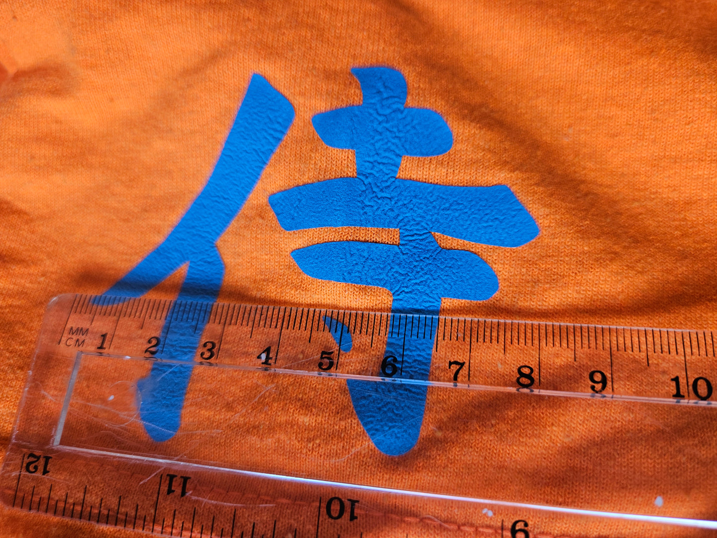 3D Puff Glow in The Dark. Samurai Print on Safety Orange T-Shirt. High quality cotton Tees with a Samurai Graphic at the front and the Samurai writing at the back and sleeve