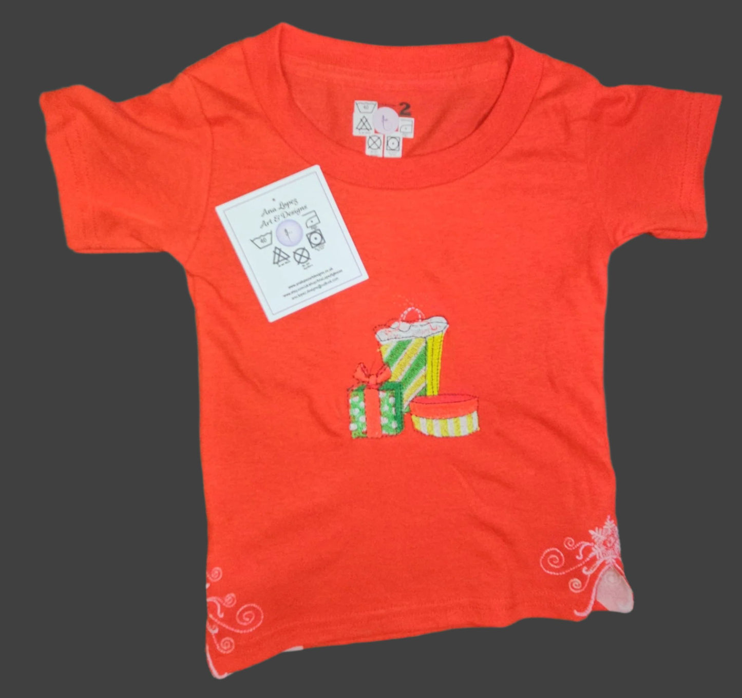 Christmas Presents embroidered, and Trendy Embroidered Sides on Red T-Shirts for Toddlers. Comfortable, soft Tees.