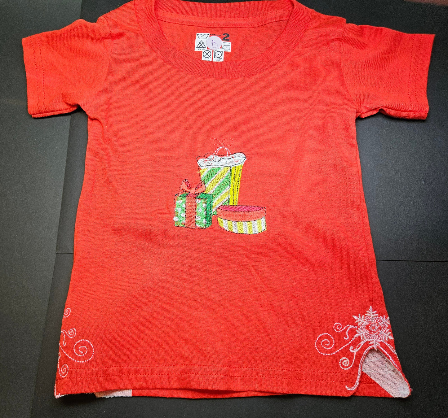 Christmas Presents embroidered, and Trendy Embroidered Sides on Red T-Shirts for Toddlers. Comfortable, soft Tees.