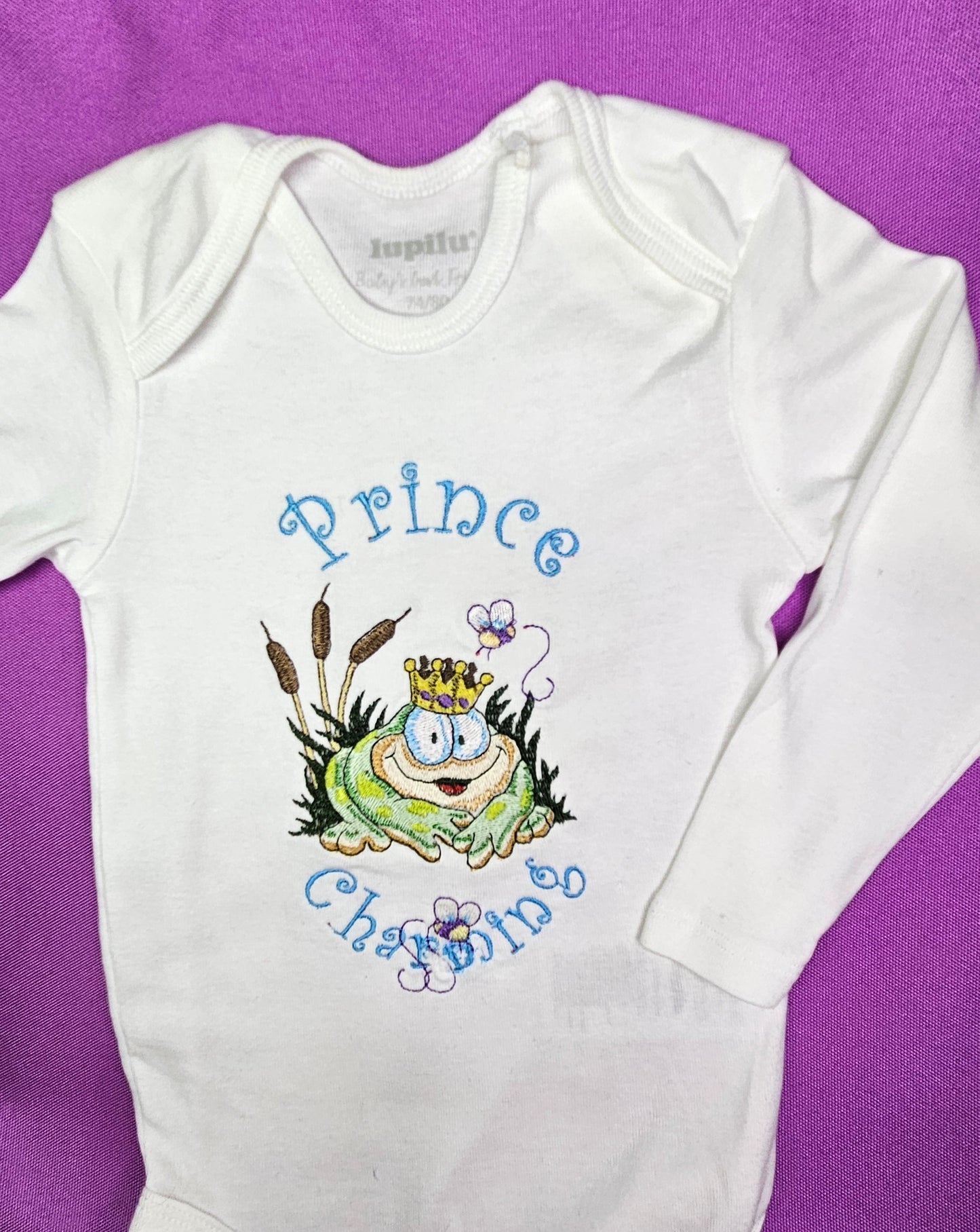 Prince Charming Froggy. Cute Design Embroidered on Organic Cotton Long and Short Sleeve Baby Bodysuit. Comfortable and soft.