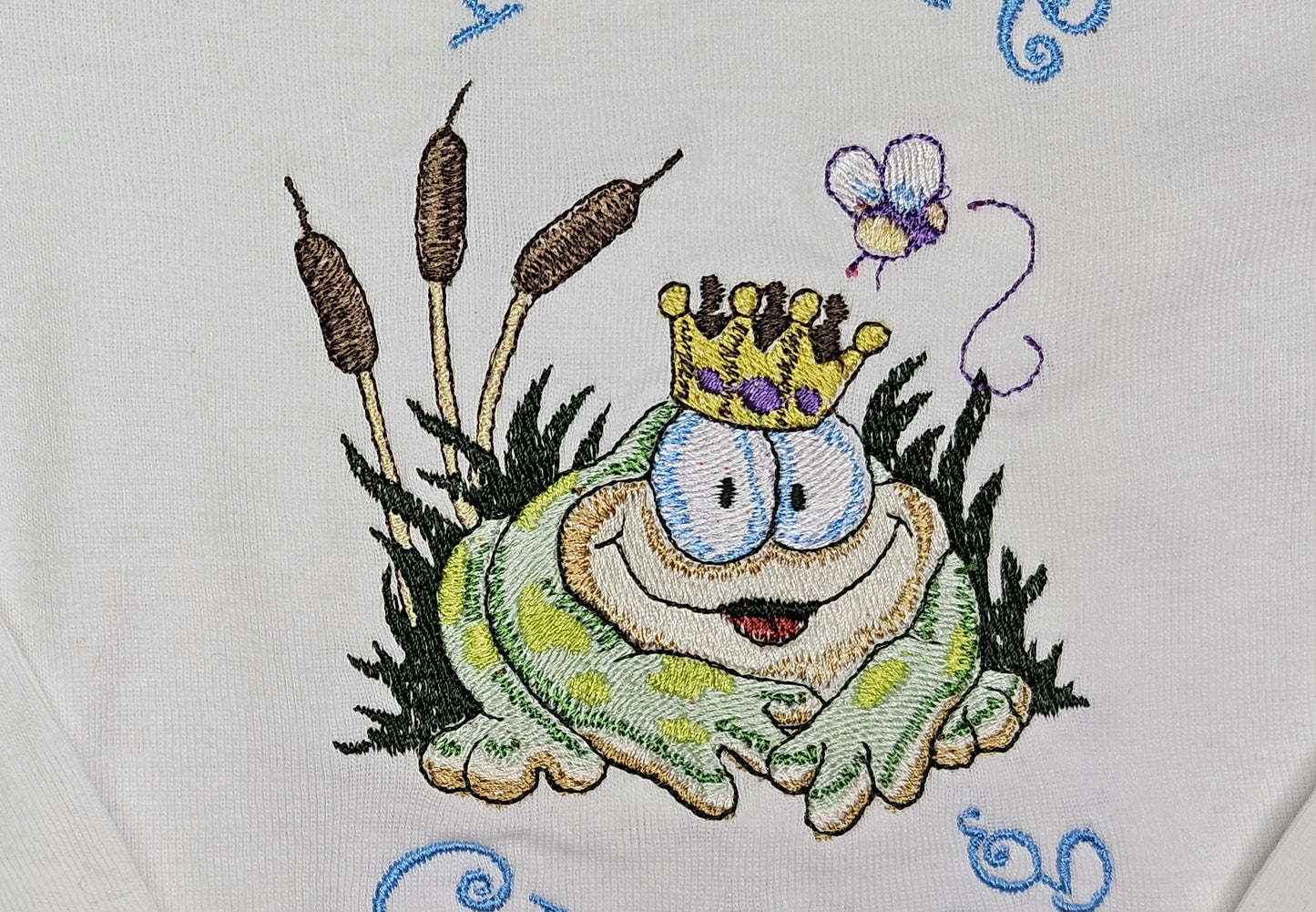 Prince Charming Froggy. Cute Design Embroidered on Organic Cotton Long and Short Sleeve Baby Bodysuit. Comfortable and soft.