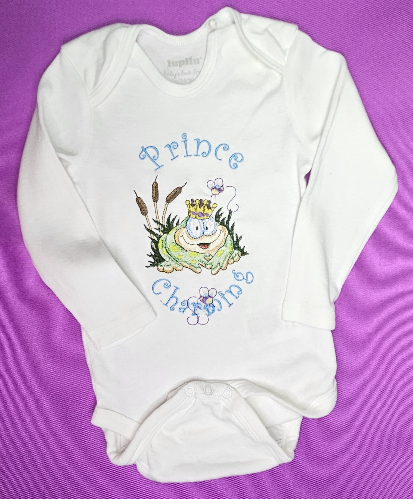 Prince Charming Froggy. Cute Design Embroidered on Organic Cotton Long and Short Sleeve Baby Bodysuit. Comfortable and soft.