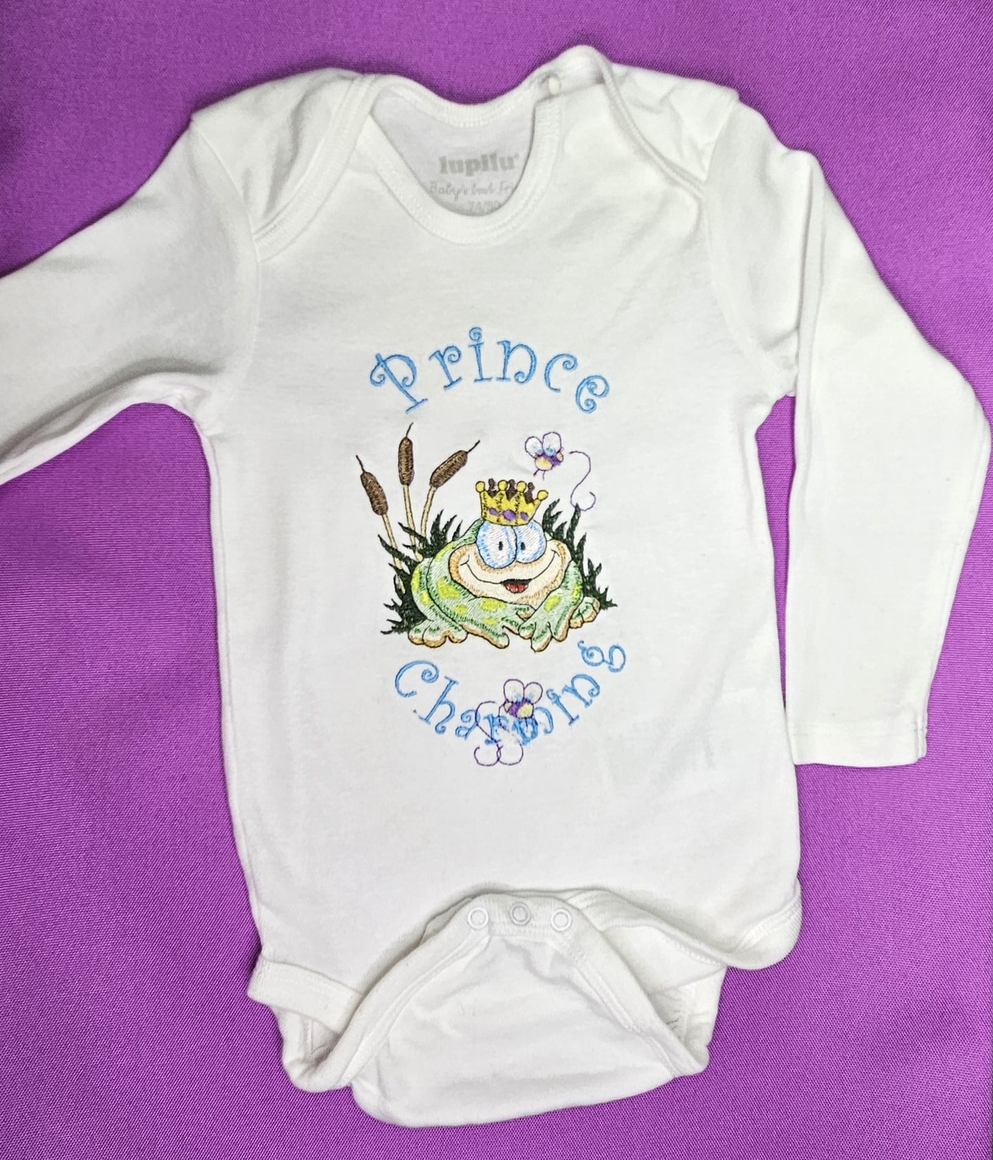 Prince Charming Froggy. Cute Design Embroidered on Organic Cotton Long and Short Sleeve Baby Bodysuit. Comfortable and soft.