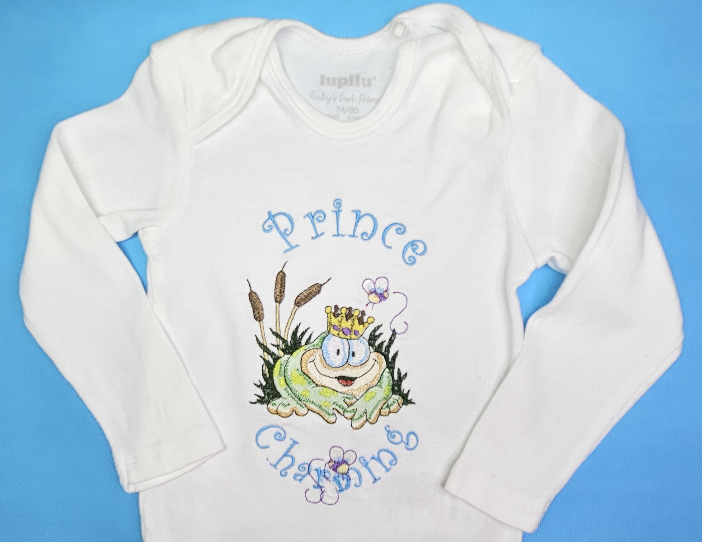 Prince Charming Froggy. Cute Design Embroidered on Organic Cotton Long and Short Sleeve Baby Bodysuit. Comfortable and soft.