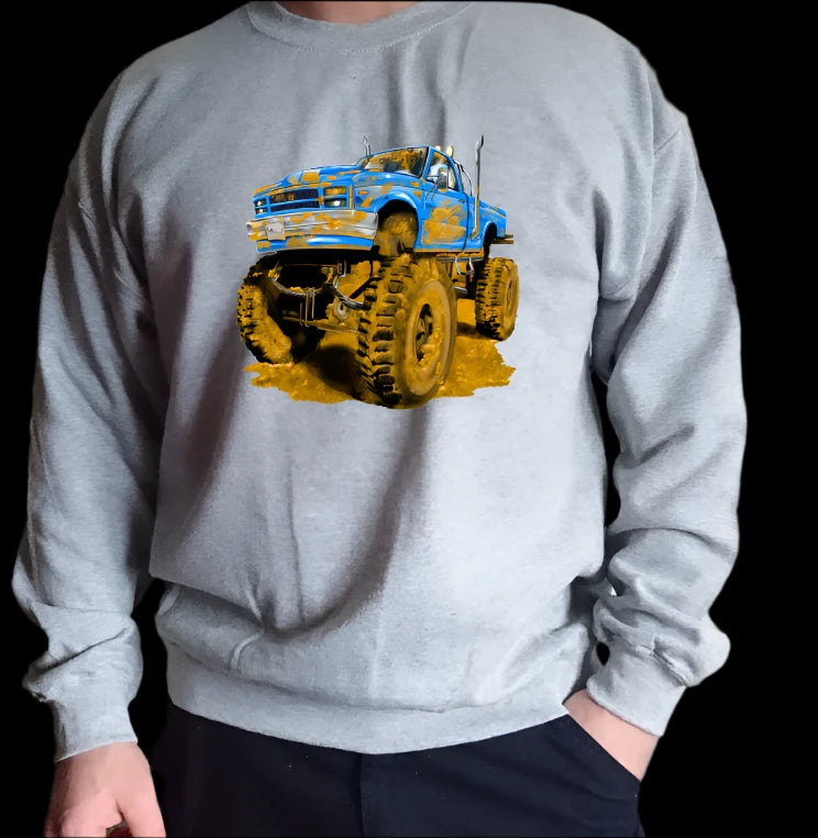 The Muddy Monster Truck Sweatshirt. Comfortable, warm, various colours for Youth and Adults.