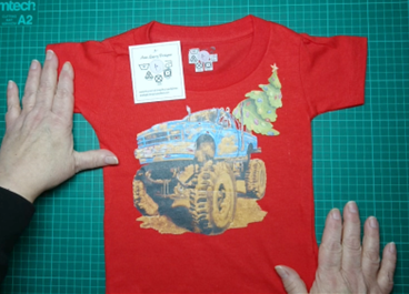 T-Shirts with the print of The Muddy Monster Truck carrying a Christmas Tree. Comfortable, soft Tees for Toddlers, Youth and Adults.