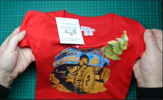 T-Shirts with the print of The Muddy Monster Truck carrying a Christmas Tree. Comfortable, soft Tees for Toddlers, Youth and Adults.